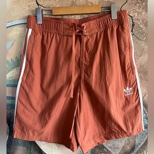 adidas Originals adicolor three stripe 10 inch shorts in beige
